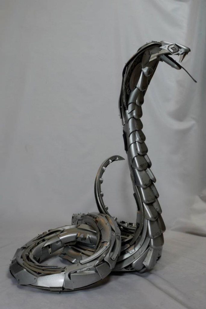 Hubcap Sculptures by Ptolmey Elrington